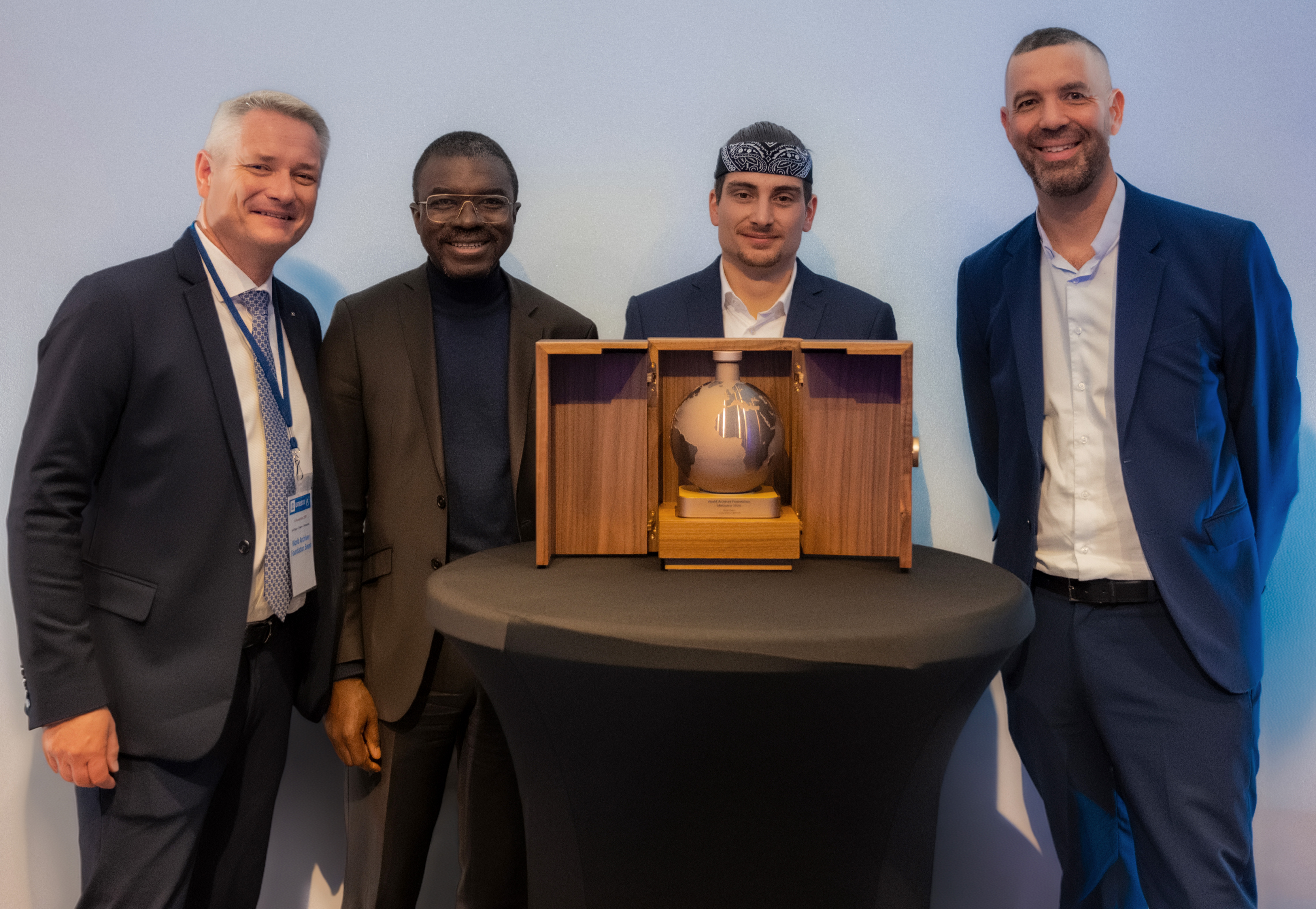 Christophe Piochon avec Lazare Eloundou Assomo, Directeur du Patrimoine mondial de l’UNESCO, Baptiste Mabillard, Fondateur de la World Archiver Foundation et Julien Pellaux, Directeur des Partenariats à l’UNESCO.