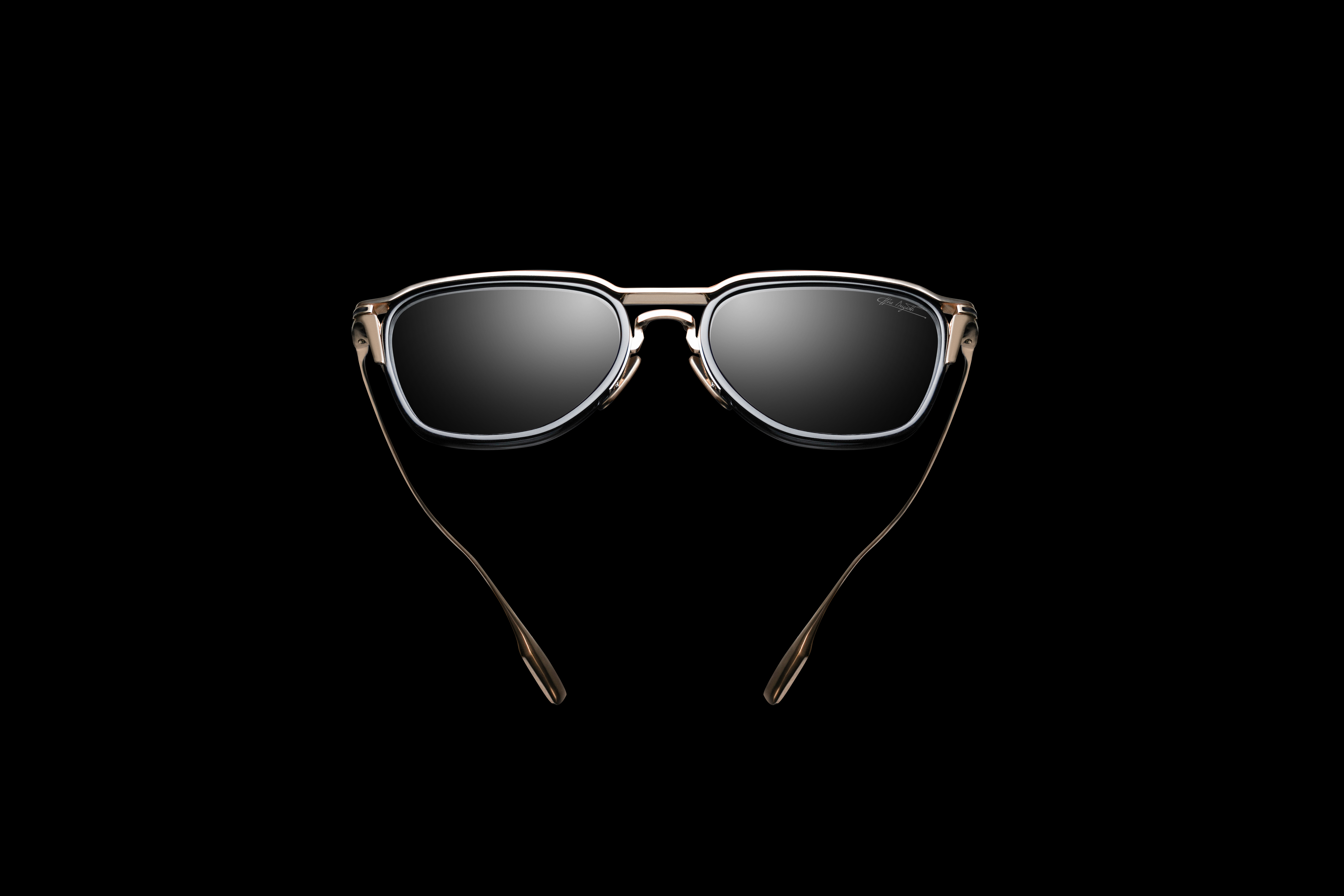 Model 50 from the new Collection Four by Bugatti Eyewear, explores a sophisticated balance of structure and warmth through its titanium and acetate combination front.