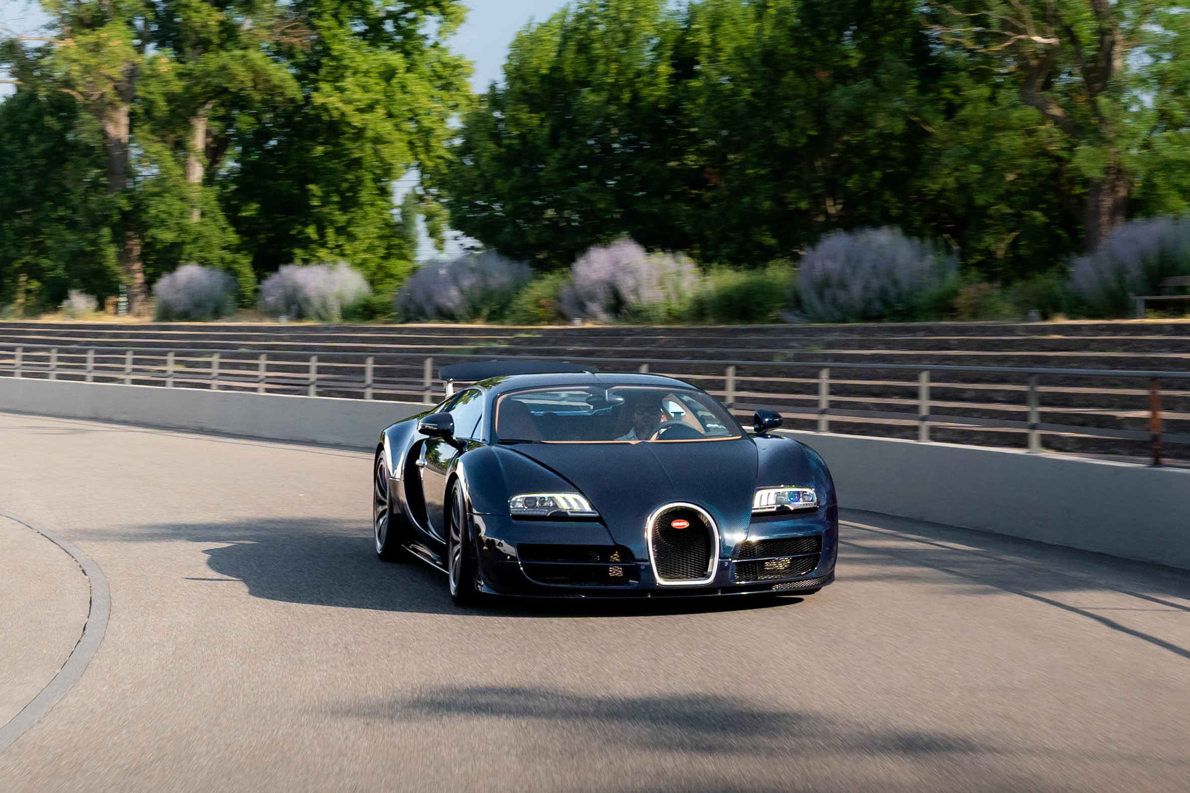 The Bugatti Veyron Super Sport takes to the track at the Musée National de l'Automobile autodrome. 