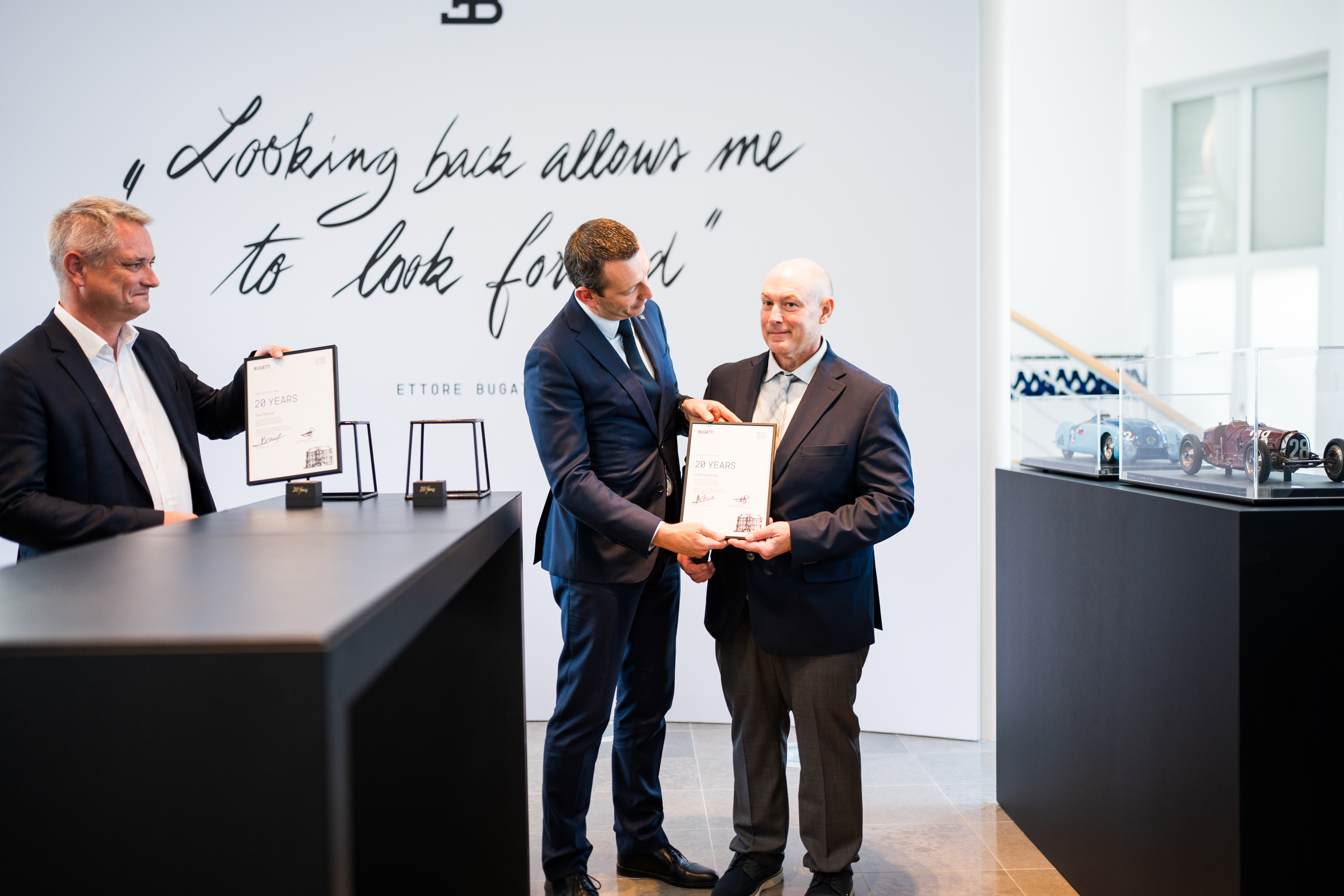 Paul Matula and Todd Testerman of Bugatti Greenwich were honored for twenty years of expertise in service of the brand.
