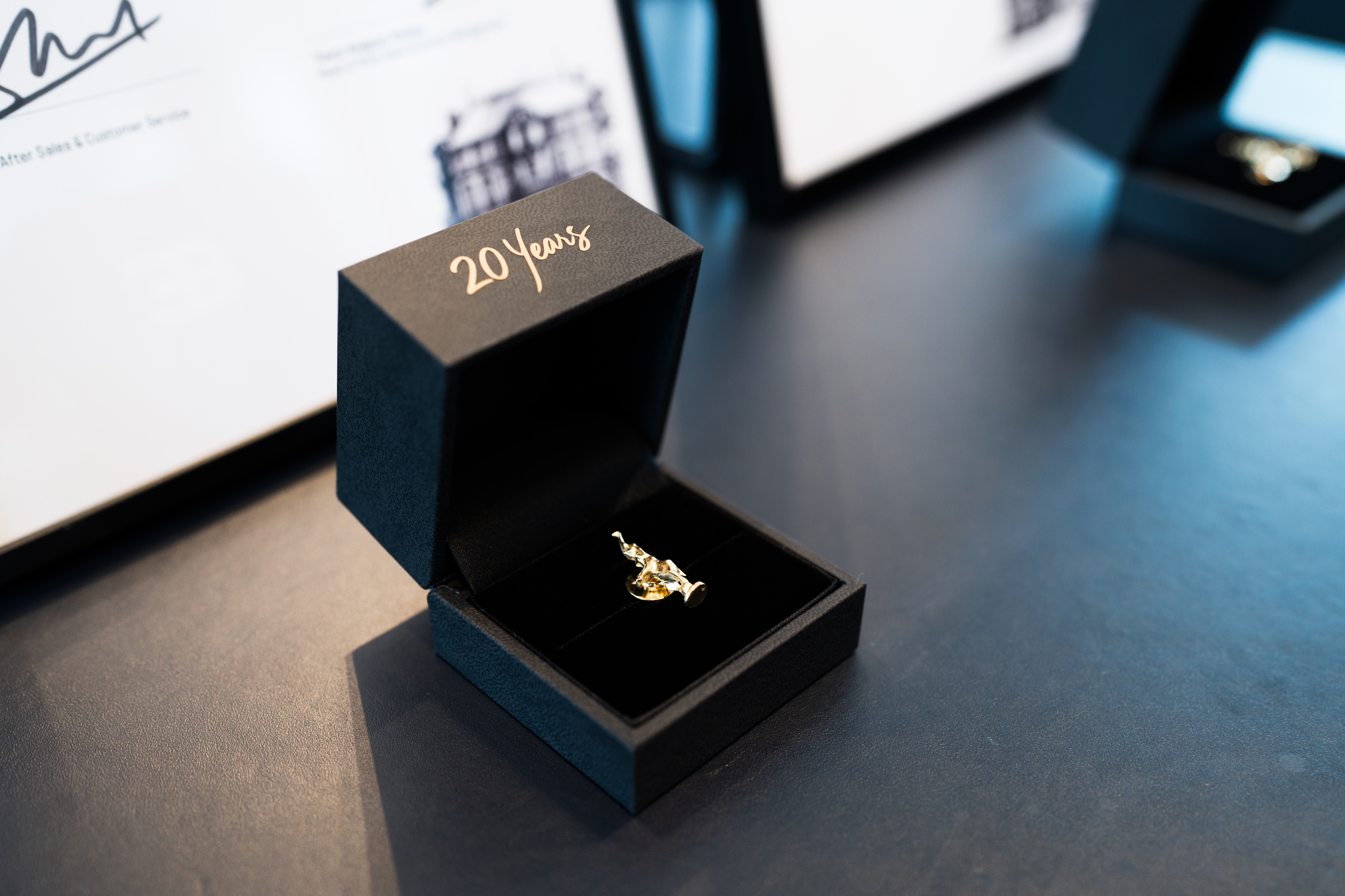 Paul Matula and Todd Testerman of Bugatti Greenwich were honored for twenty years of expertise in service of the brand.
