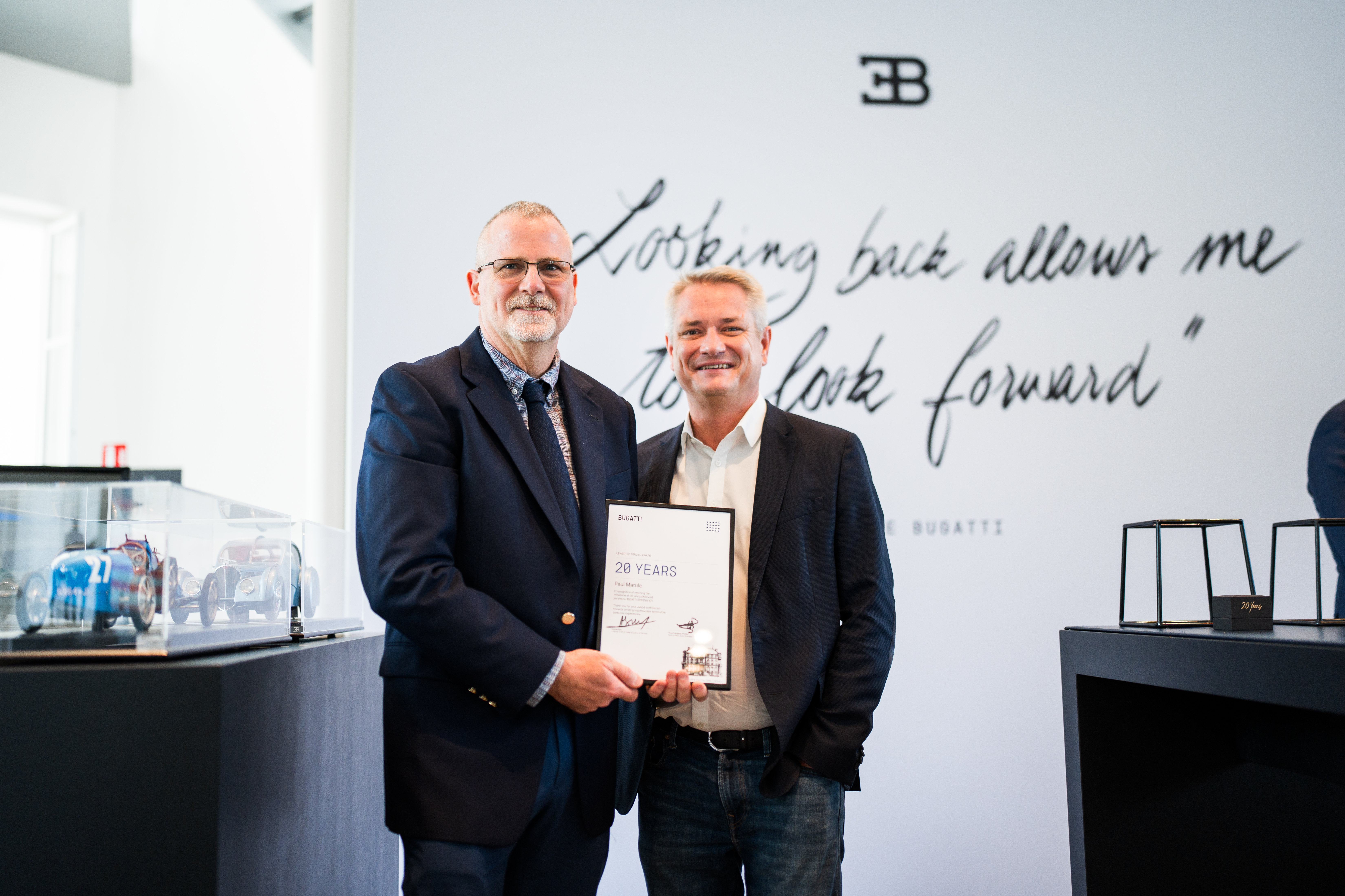 Paul Matula and Todd Testerman of Bugatti Greenwich were honored for twenty years of expertise in service of the brand.